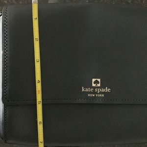 Kate Spade purse. Black. Shoulder strap. Comes with care tag.